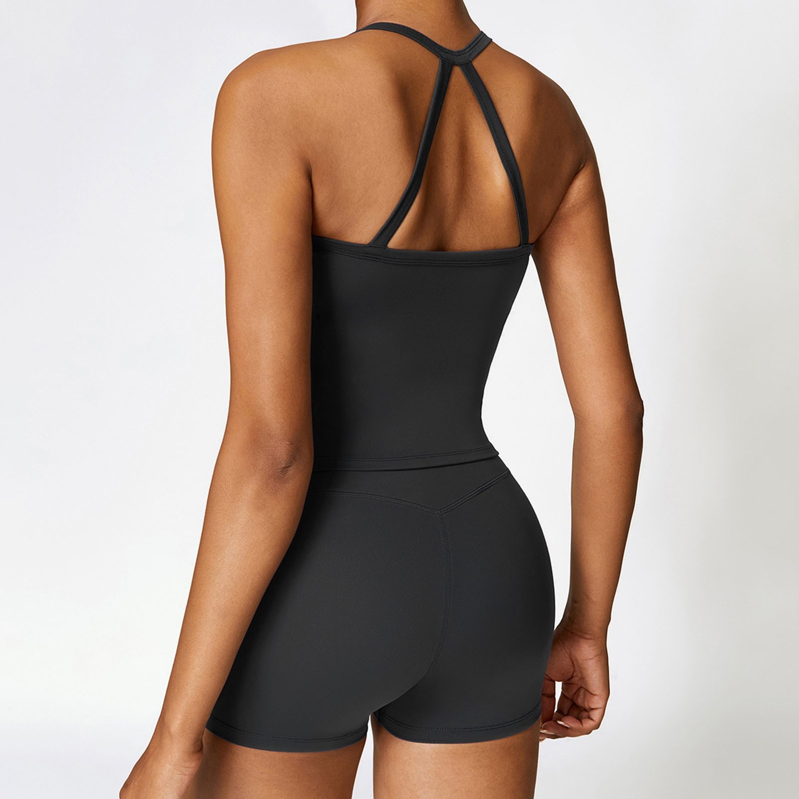 thumbnail image 5 of Conjunto de yoga de 2 piezas para mujer: camiseta sin mangas con espalda descubierta y pantalones cortos. Tejido transpirable, tirantes modernos, ideal para fitness/verano, varias tallas., 5 of 7